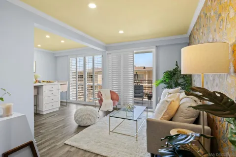 a living room with furniture and a lamp