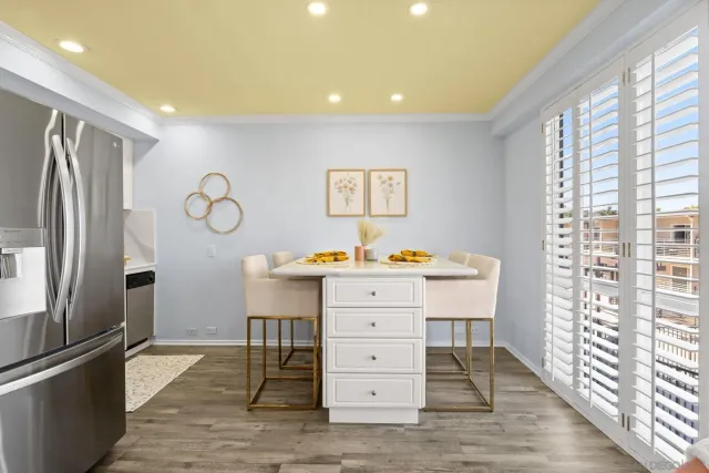 a view with cabinets and wooden floor