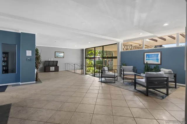 a view of a hallway with stairs