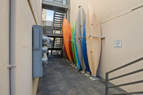a view of a refrigerator and window in a room