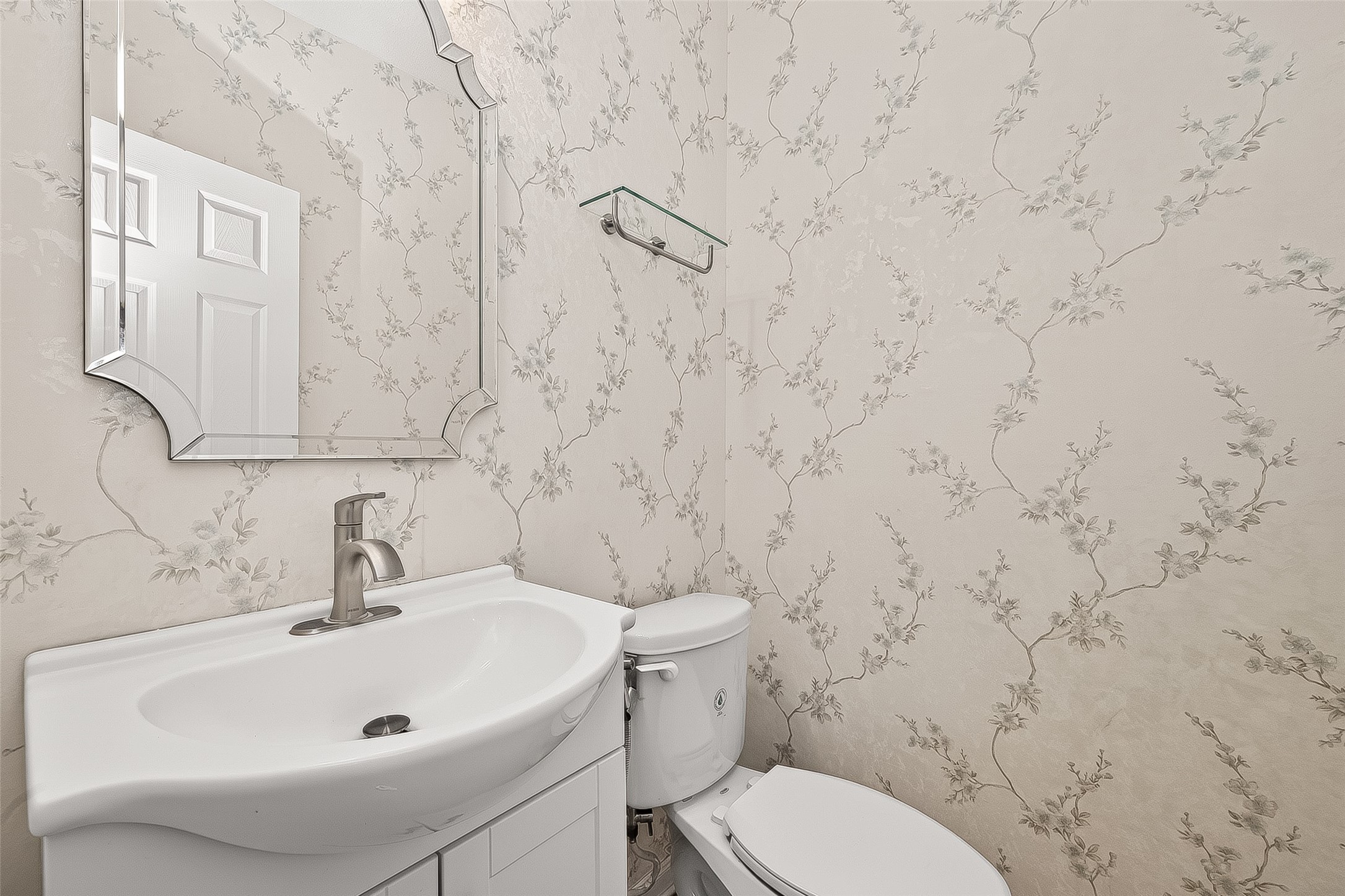 21454 Piralta Ridge Lane Katy, TX 77449 - Photo 15 of 33 a bathroom with a sink a toilet and mirror