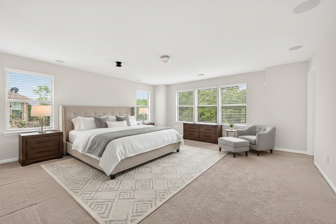 21454 Piralta Ridge Lane Katy, TX 77449 - Photo 17 of 33 a spacious bedroom with a bed and glass window