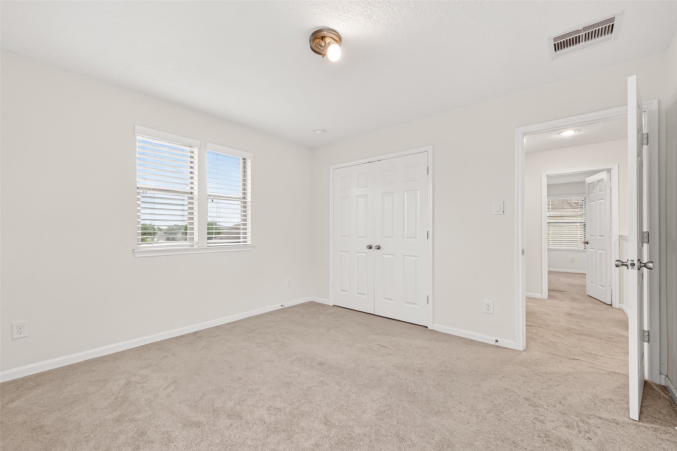 21454 Piralta Ridge Lane Katy, TX 77449 - Photo 24 of 33 an empty room with windows