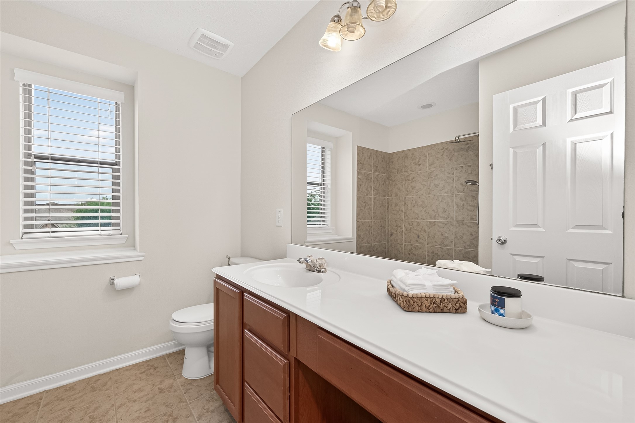 21454 Piralta Ridge Lane Katy, TX 77449 - Photo 26 of 33 a bathroom with a sink and a mirror