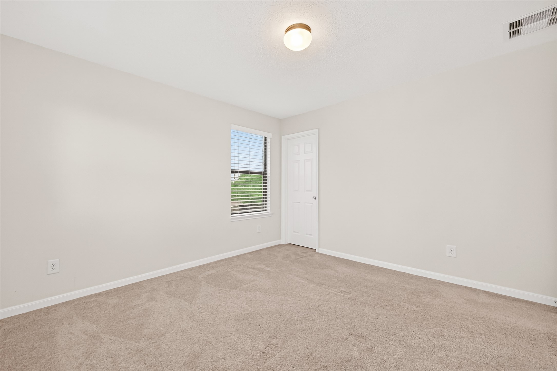 21454 Piralta Ridge Lane Katy, TX 77449 - Photo 28 of 33 an empty room with a window