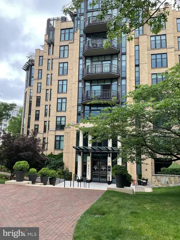 a building view with a garden space