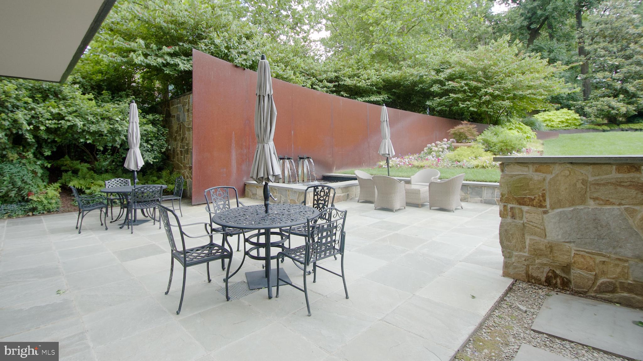 4301 Military Road Northwest, Unit 208 Washington, DC 20015 - Photo 21 of 32 an outdoor space with furniture and potted plants