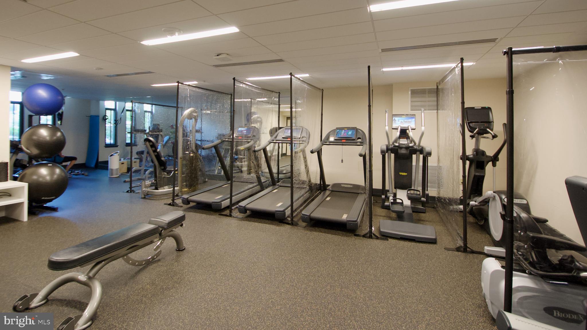 4301 Military Road Northwest, Unit 208 Washington, DC 20015 - Photo 26 of 32 a view of a room with gym equipment