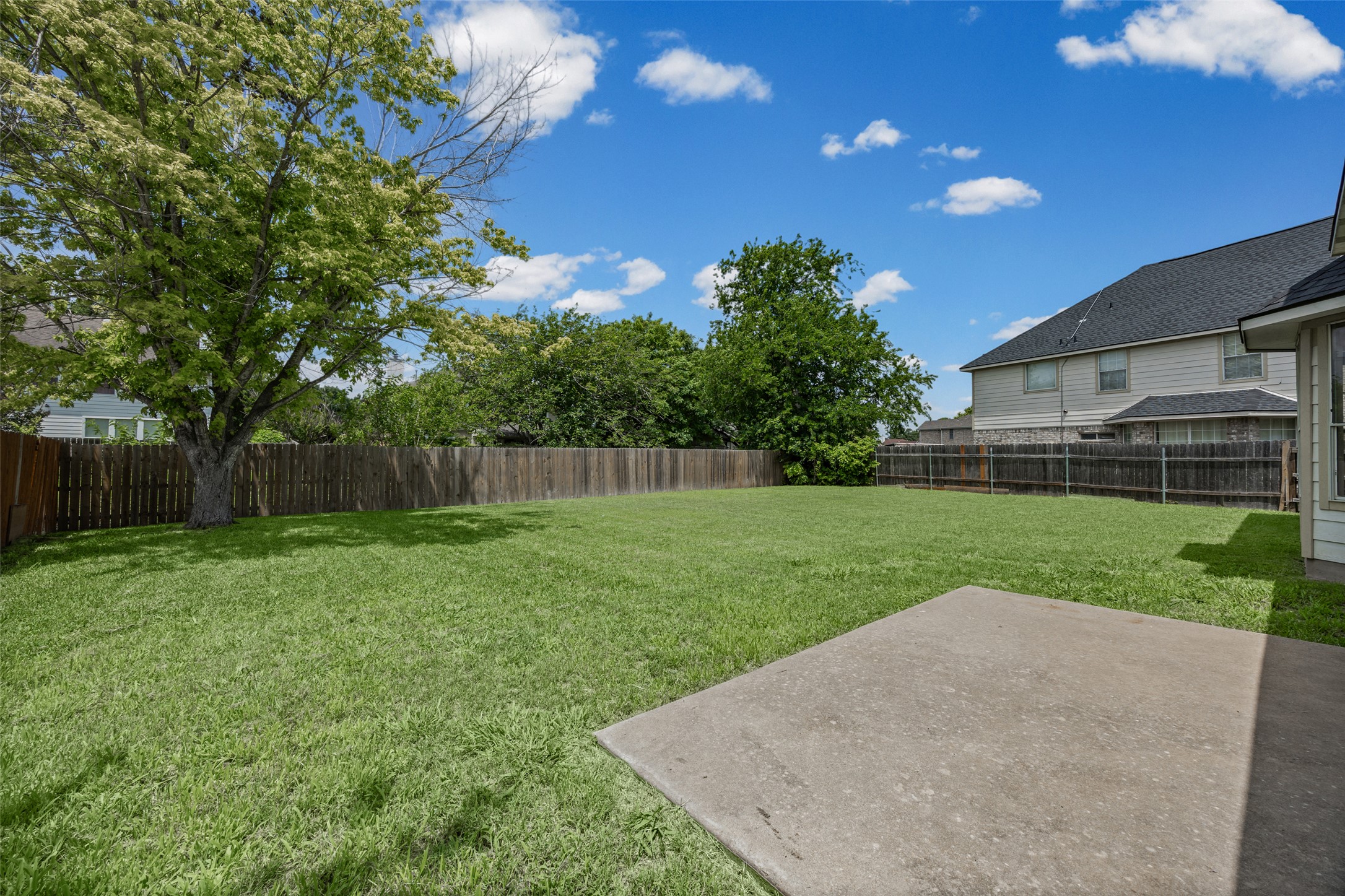 402 Autumn Trail Georgetown, TX 78626 - Photo 23 of 25 a view of a backyard with green space