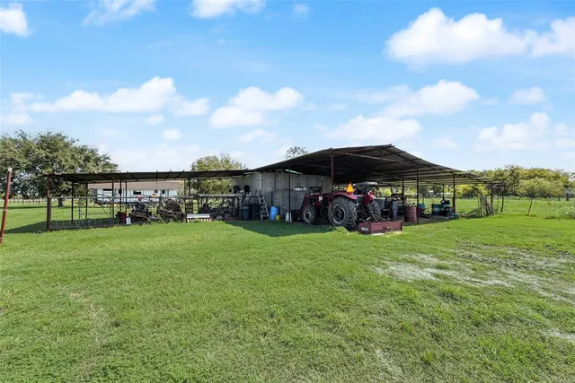a view of a lake with houses in the background