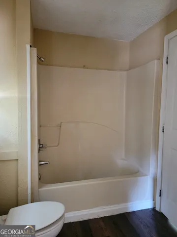a bathroom with a bathtub