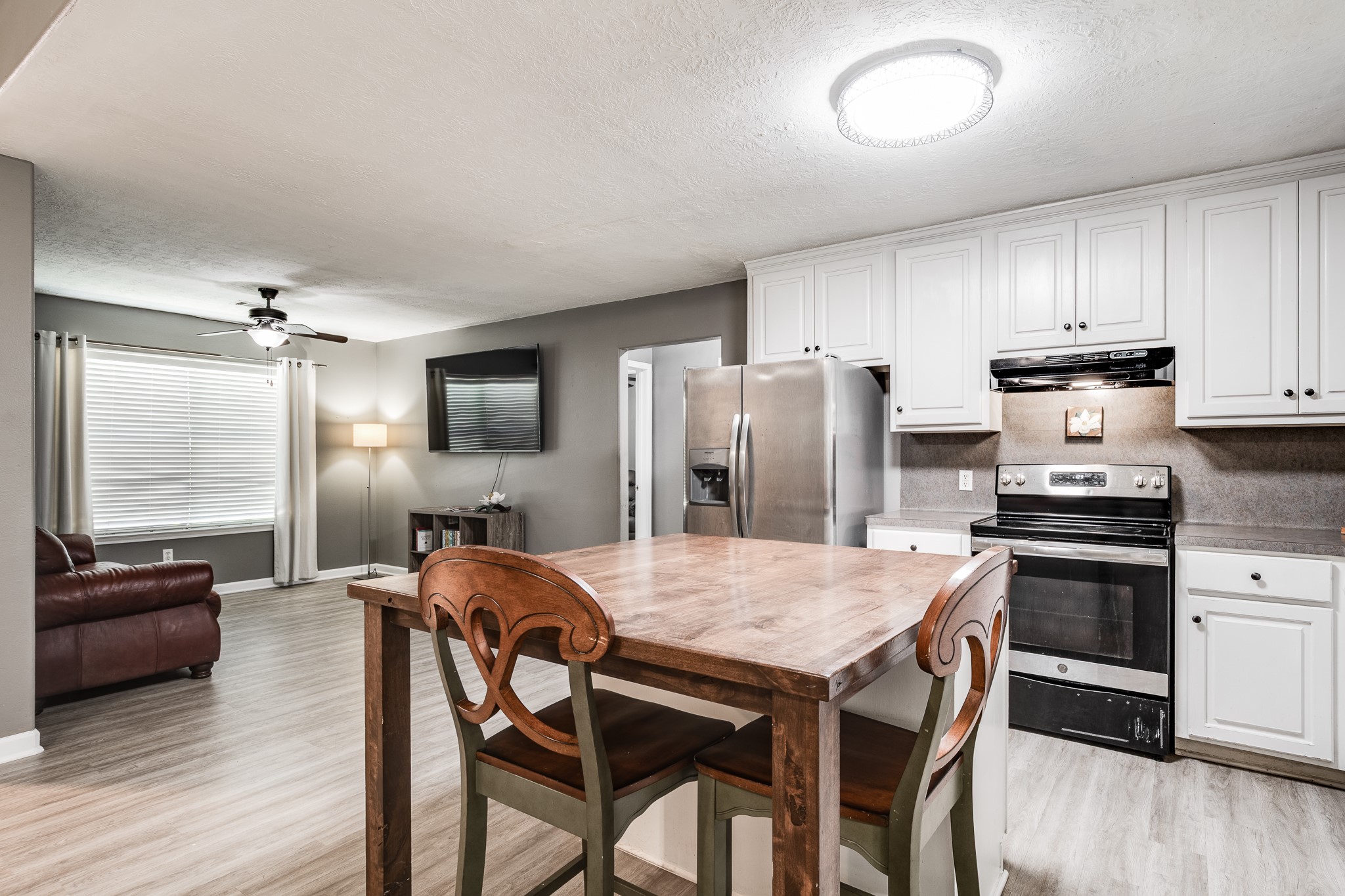 16392 Many Trees Lane Conroe, TX 77302 - Photo 13 of 33 Warm wood highlights the kitchen