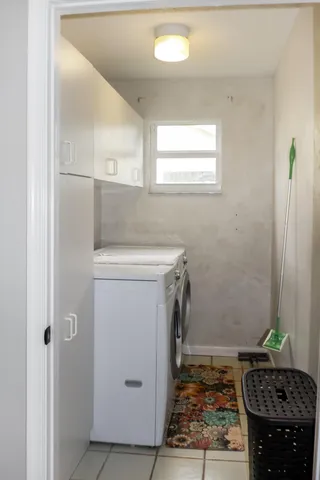 a bathroom with a shower toilet and a sink