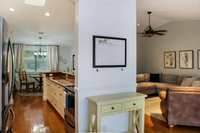 a view of a patio with table and chairs