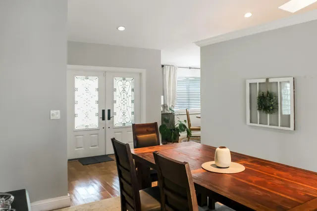 a view of a hallway with front door