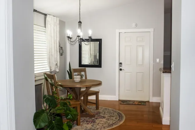 a kitchen with a stove and a refrigerator