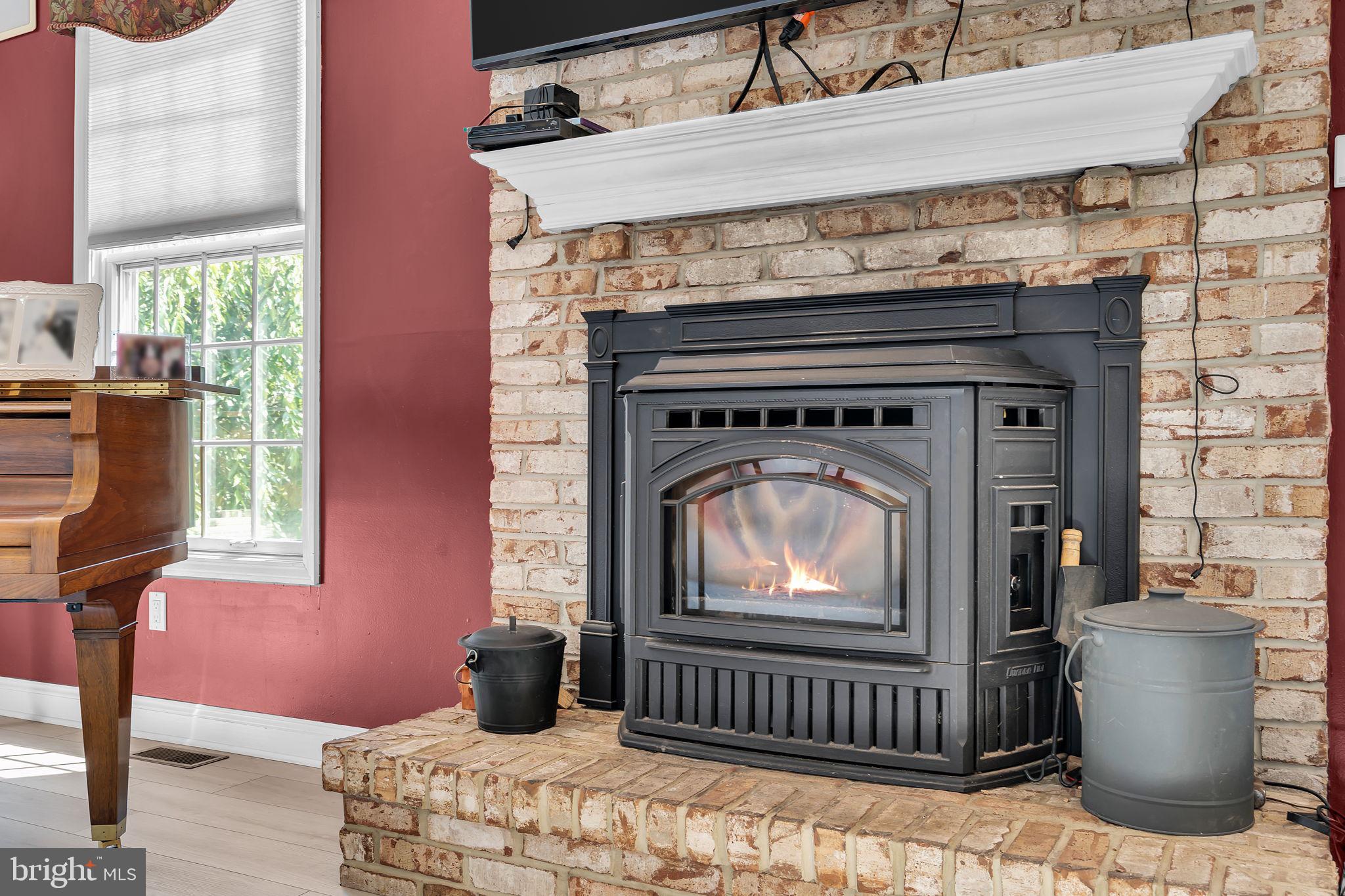 73 Paulson Road Wrightstown, NJ 08562 - Photo 20 of 34 Cozy warmth by the fireplace glow.