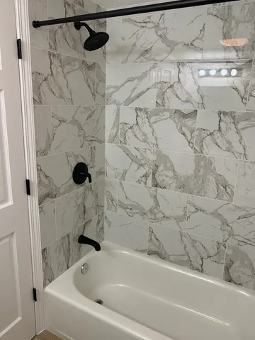 a bathroom with a bathtub