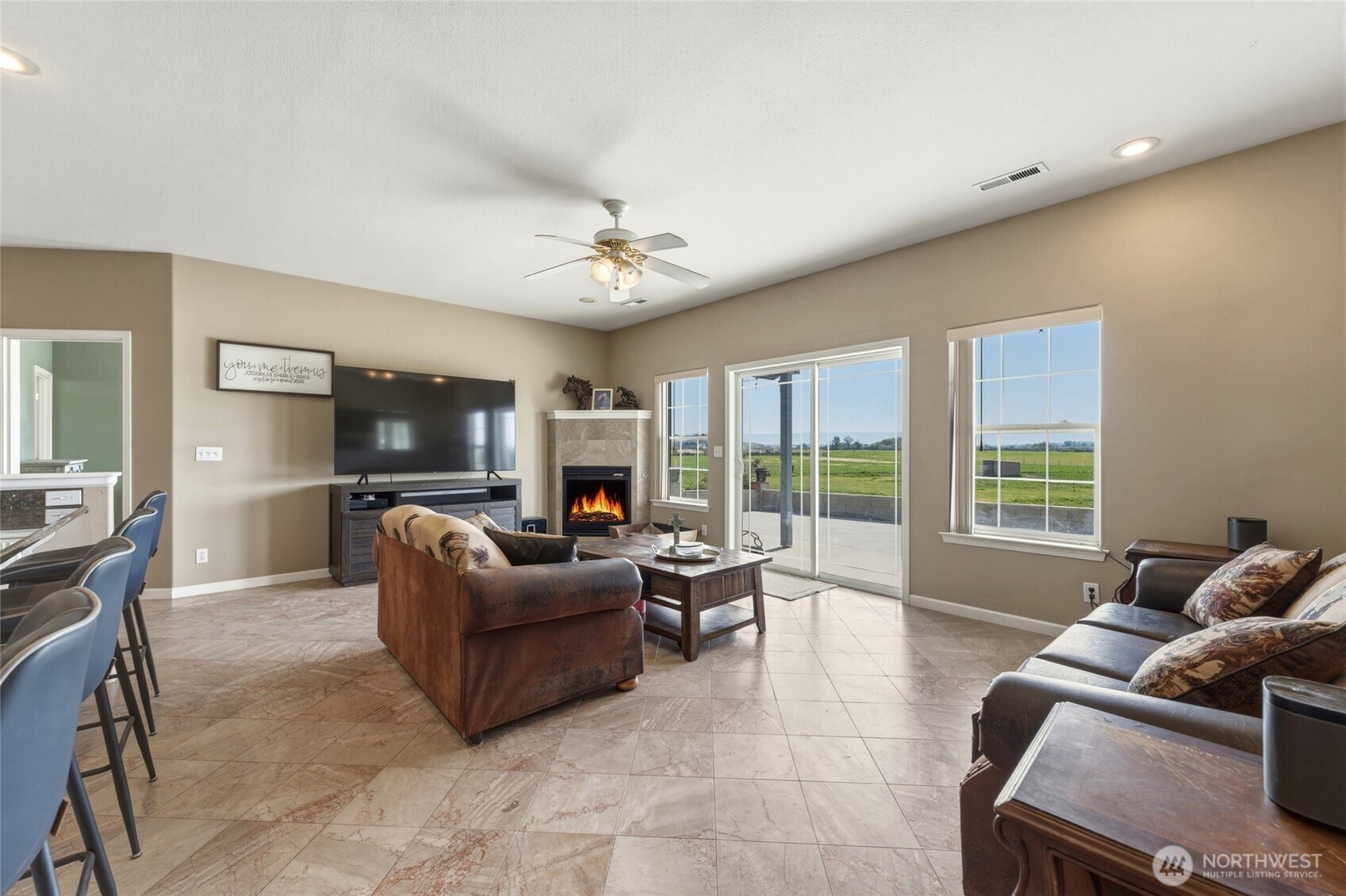 219 Reeds Road Touchet, WA 99360 - Photo 13 of 40 a living room with furniture and a fireplace