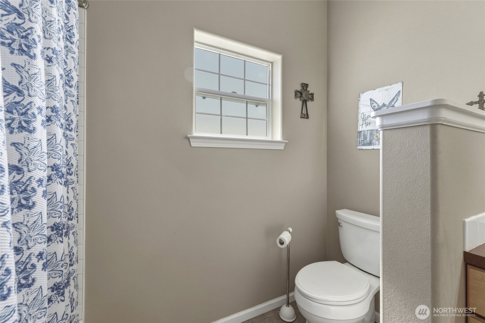 219 Reeds Road Touchet, WA 99360 - Photo 26 of 40 a white toilet sitting next to a window