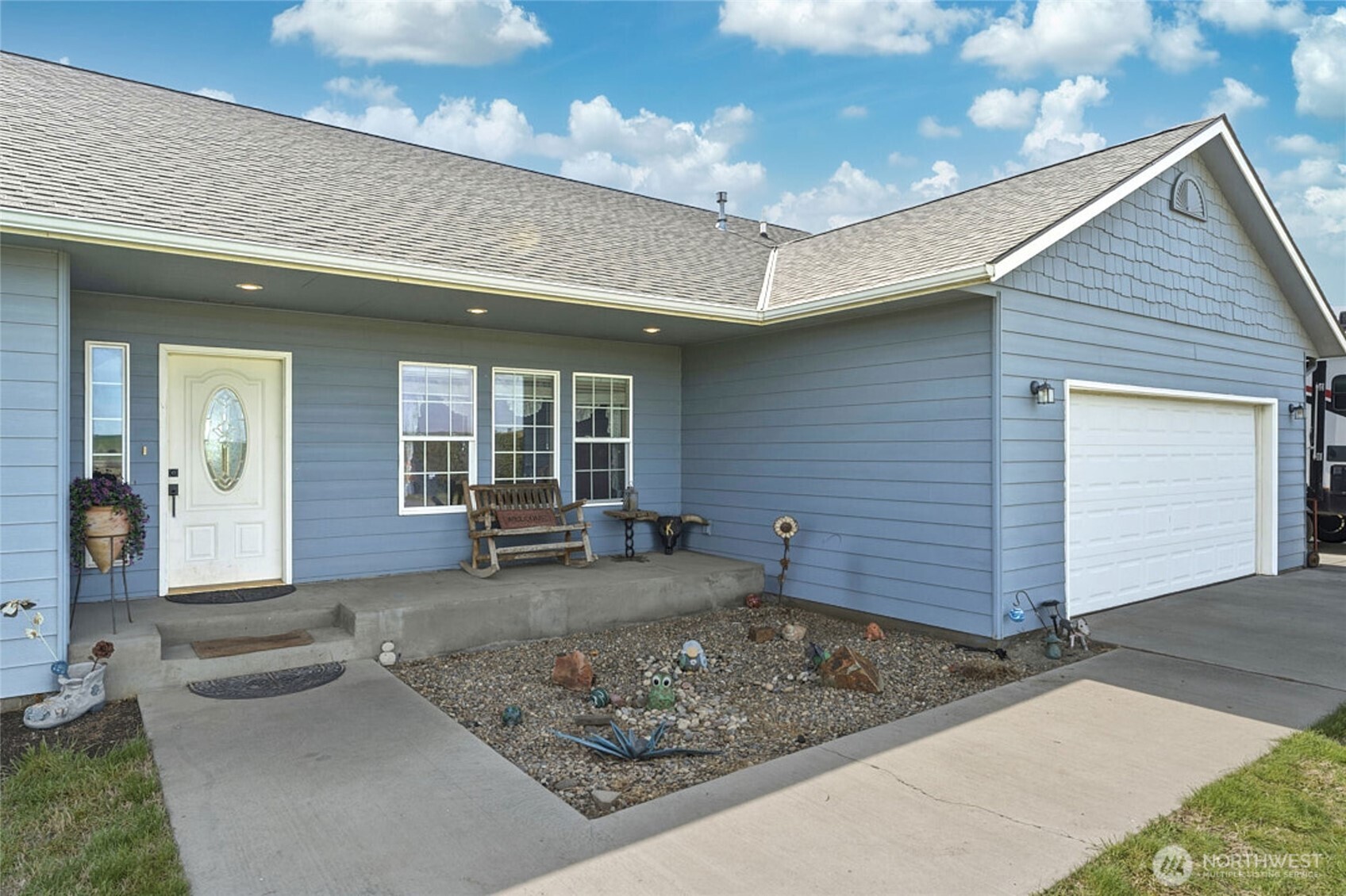 219 Reeds Road Touchet, WA 99360 - Photo 3 of 40 a view of a house with backyard porch and sitting area