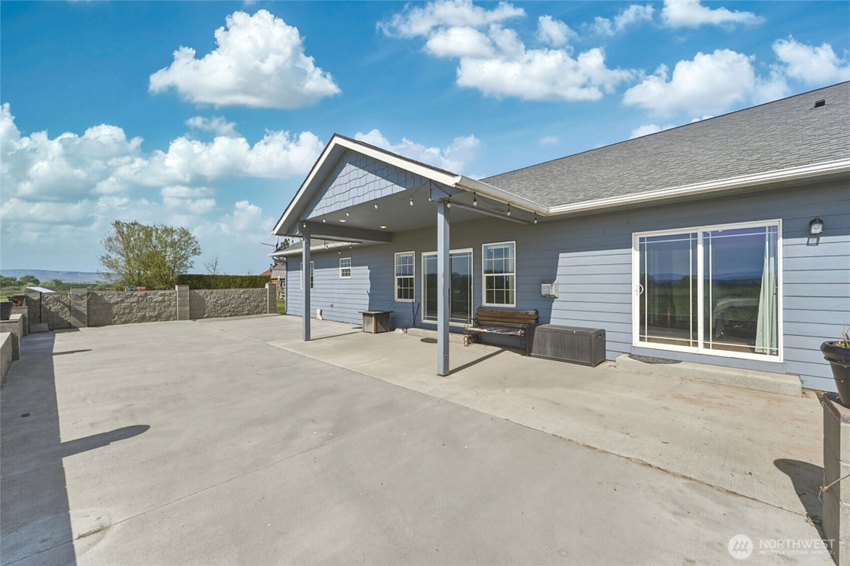 219 Reeds Road Touchet, WA 99360 - Photo 33 of 40 a view of a house with porch and garden