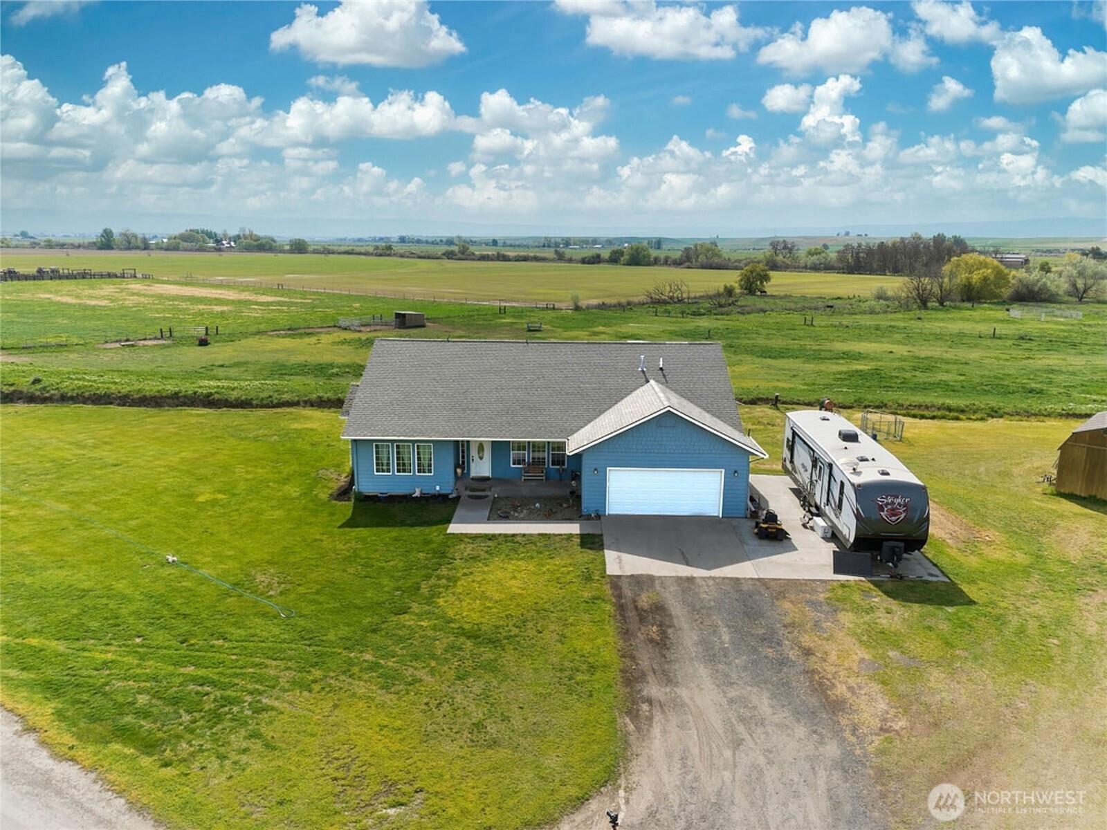 219 Reeds Road Touchet, WA 99360 - Photo 35 of 40 a view of a house with a yard