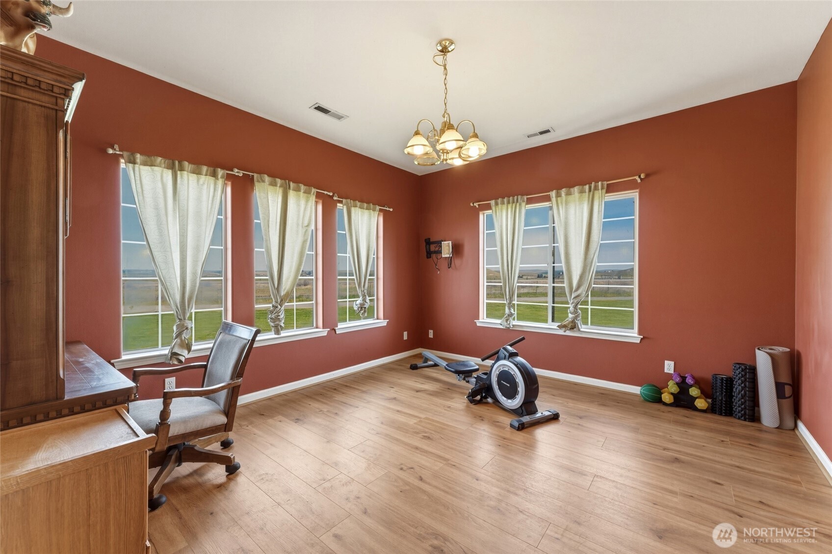 219 Reeds Road Touchet, WA 99360 - Photo 5 of 40 a view of a livingroom with workspace and a window