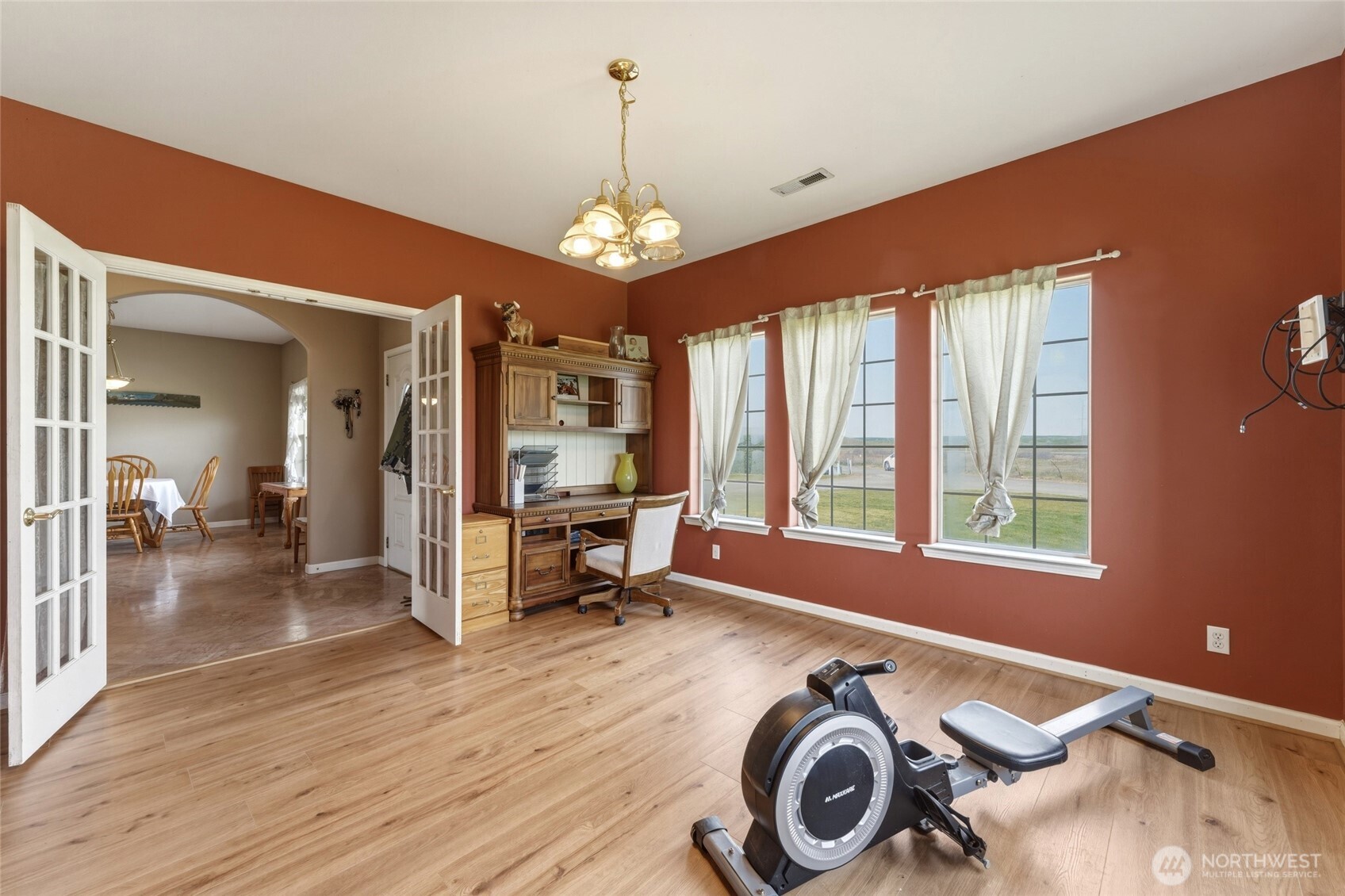219 Reeds Road Touchet, WA 99360 - Photo 6 of 40 a view of livingroom with hardwood floor and a ceiling fan