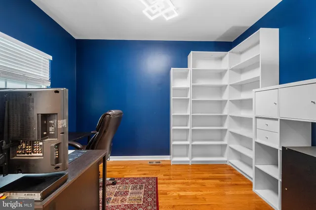 a view of a workspace with furniture