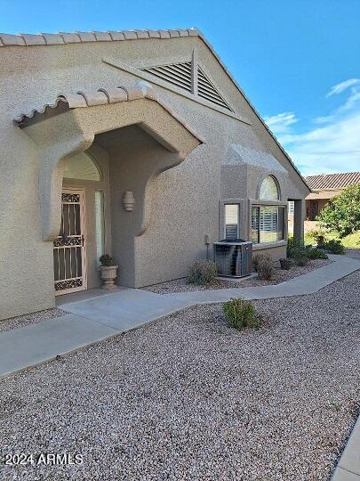 4202 East Broadway Road, Unit 198 Mesa, AZ 85206 - Photo 14 of 47 Side Entry with sidewalk to rear of home