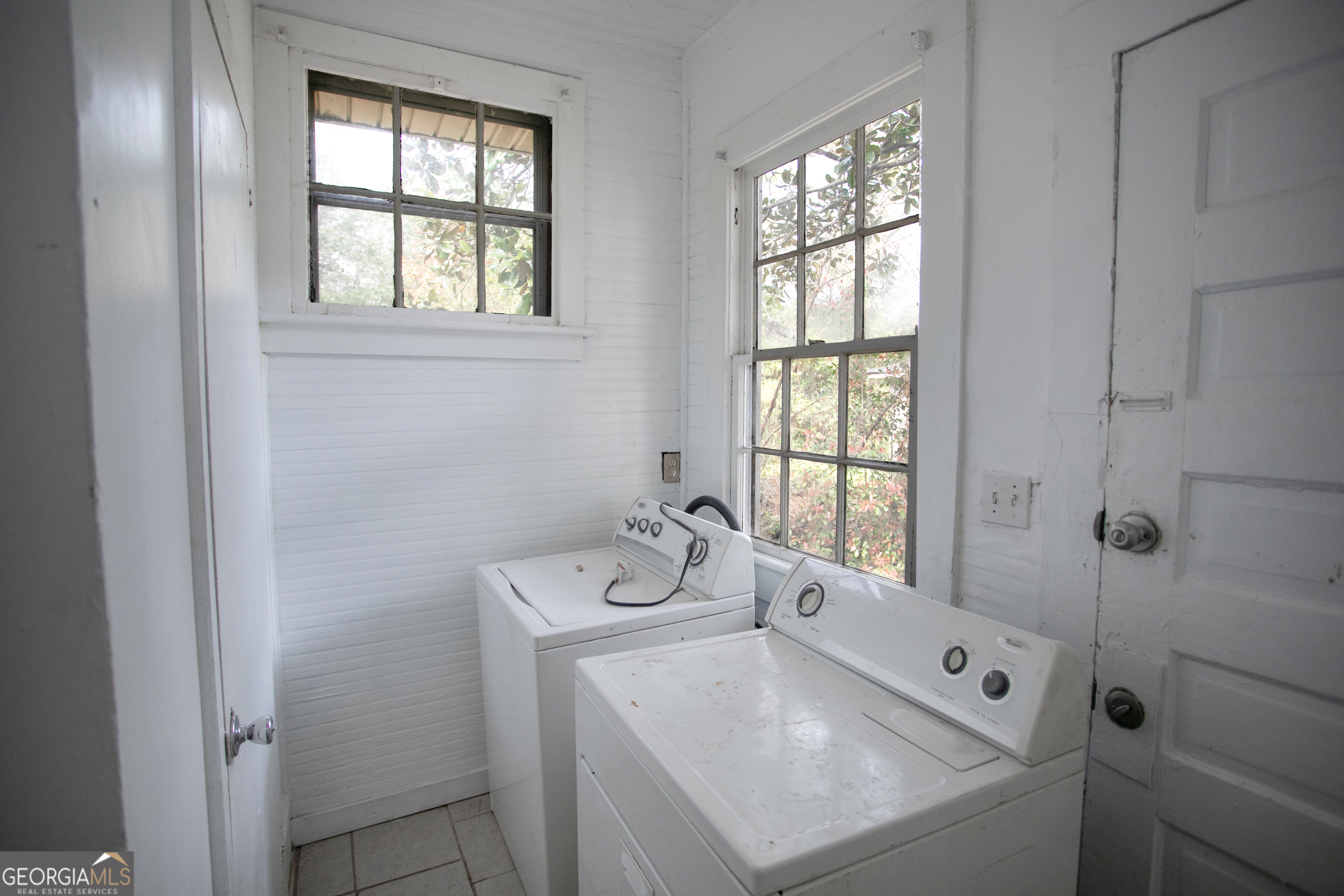 402 Boulevard Street Fort Valley, GA 31030 - Photo 8 of 10 a bathroom with a sink and a window