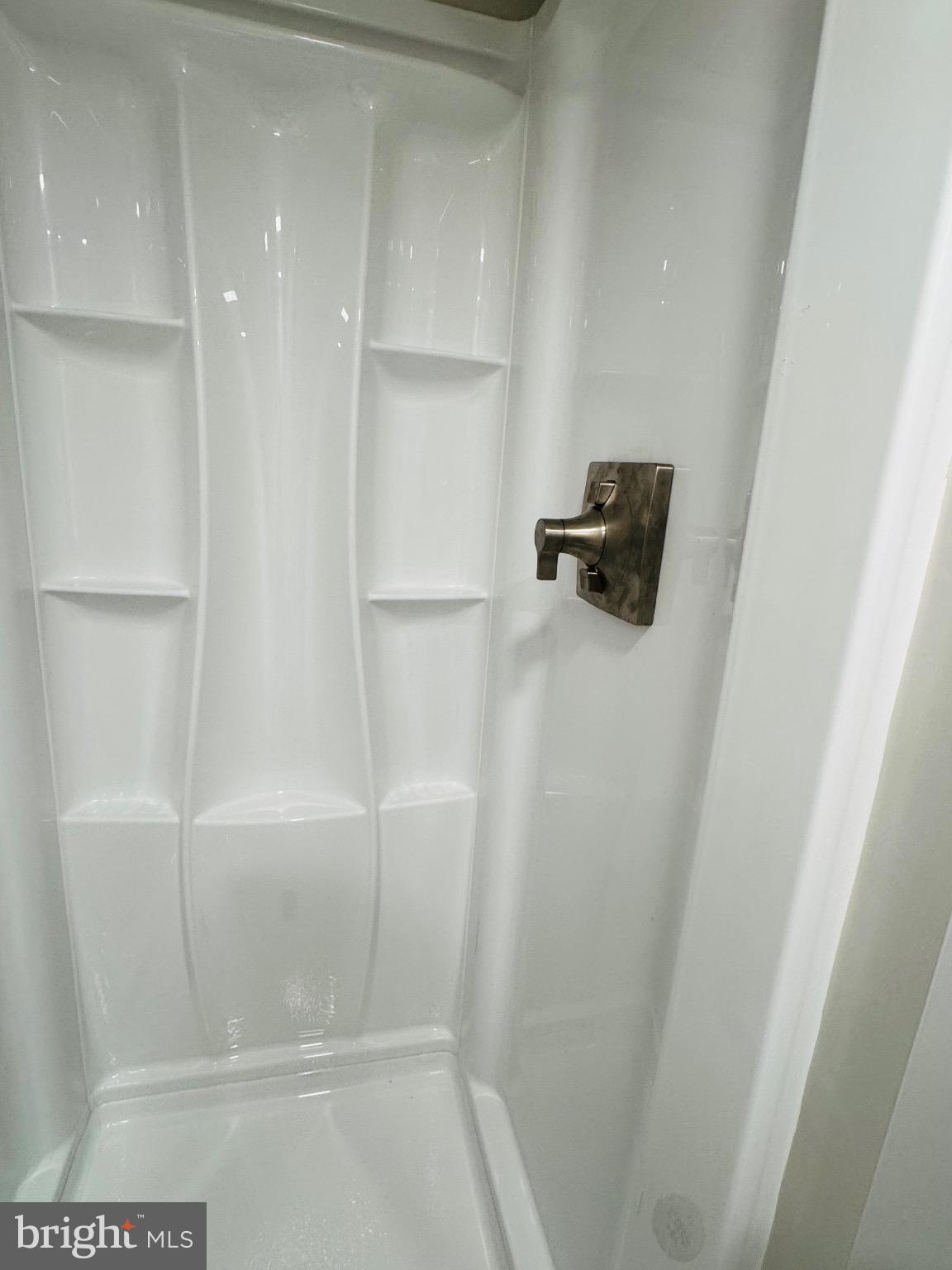 8111 Analee Avenue Rosedale, MD 21237 - Photo 20 of 23 Sleek, modern shower.
