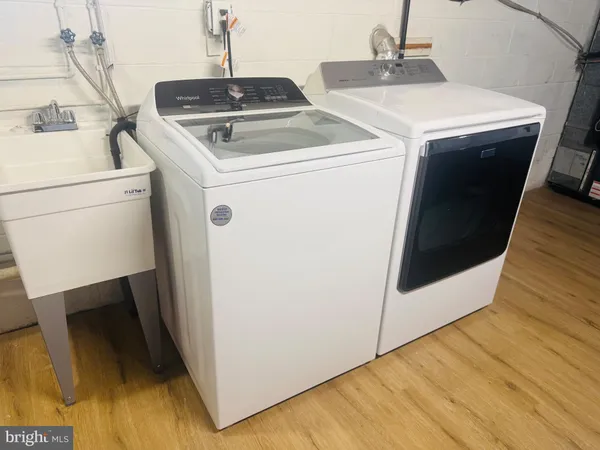 a utility room with dryer and washer