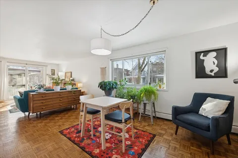 a front view of house with outdoor seating