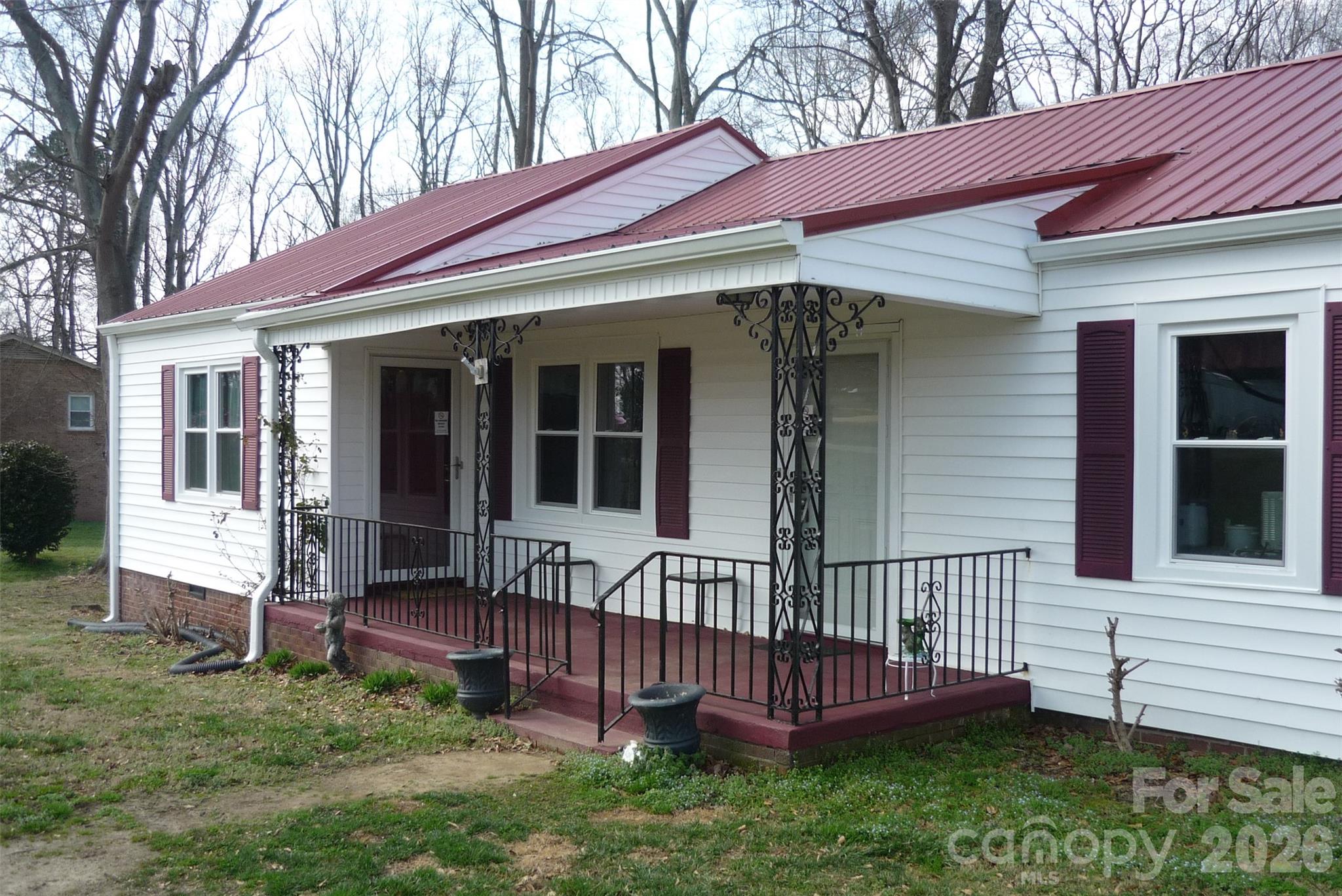 120 Bradley Road Shelby, NC 28152 - Photo 2 of 41 a view of a house with a small yard and wooden fence