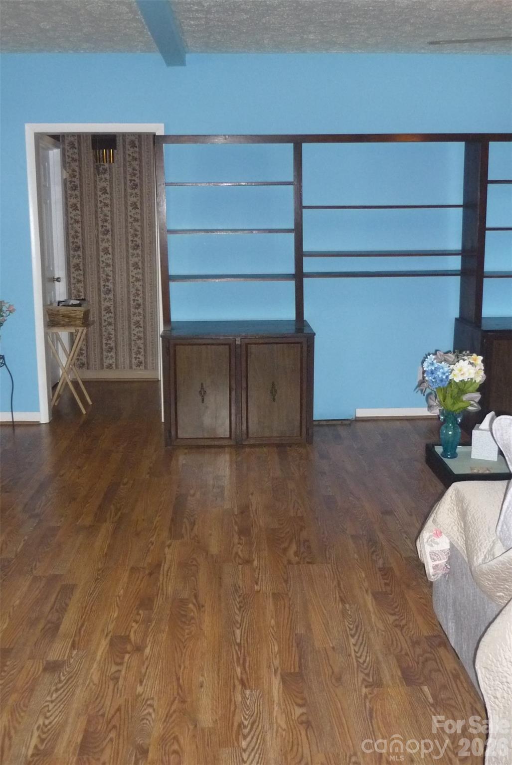120 Bradley Road Shelby, NC 28152 - Photo 23 of 41 a view of an empty room with wooden floor and a cabinet