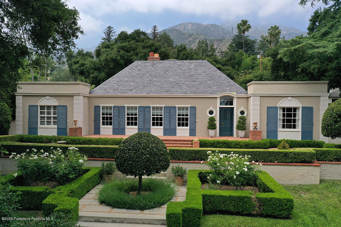 1987 Braeburn Road Altadena, CA 91001 - Photo 1 of 48 a front view of a house with a yard and outdoor seating