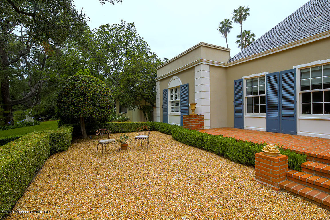 1987 Braeburn Road Altadena, CA 91001 - Photo 3 of 48 a view of a house with backyard sitting area and garden