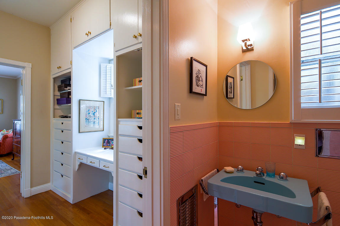 1987 Braeburn Road Altadena, CA 91001 - Photo 25 of 48 a bathroom with a sink mirror and vanity