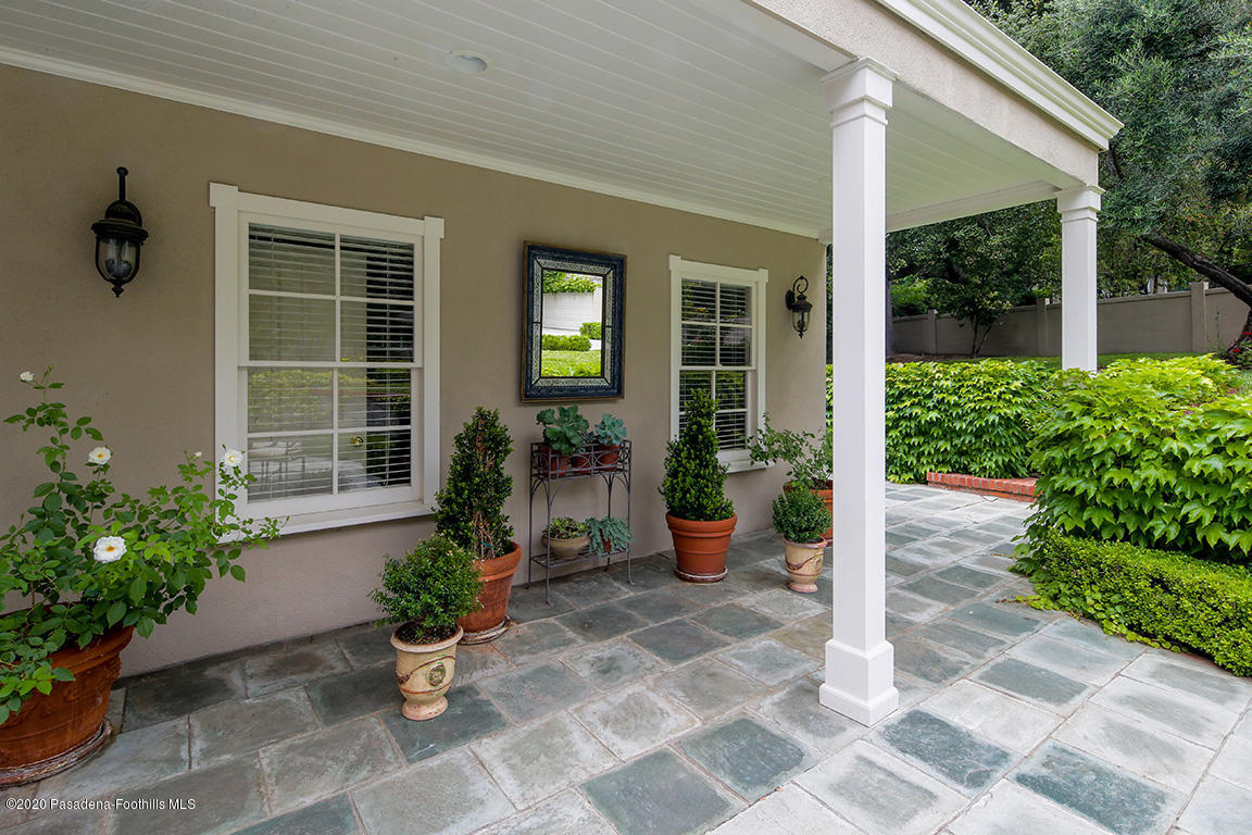 1987 Braeburn Road Altadena, CA 91001 - Photo 28 of 48 a view of a house with backyard sitting area and garden