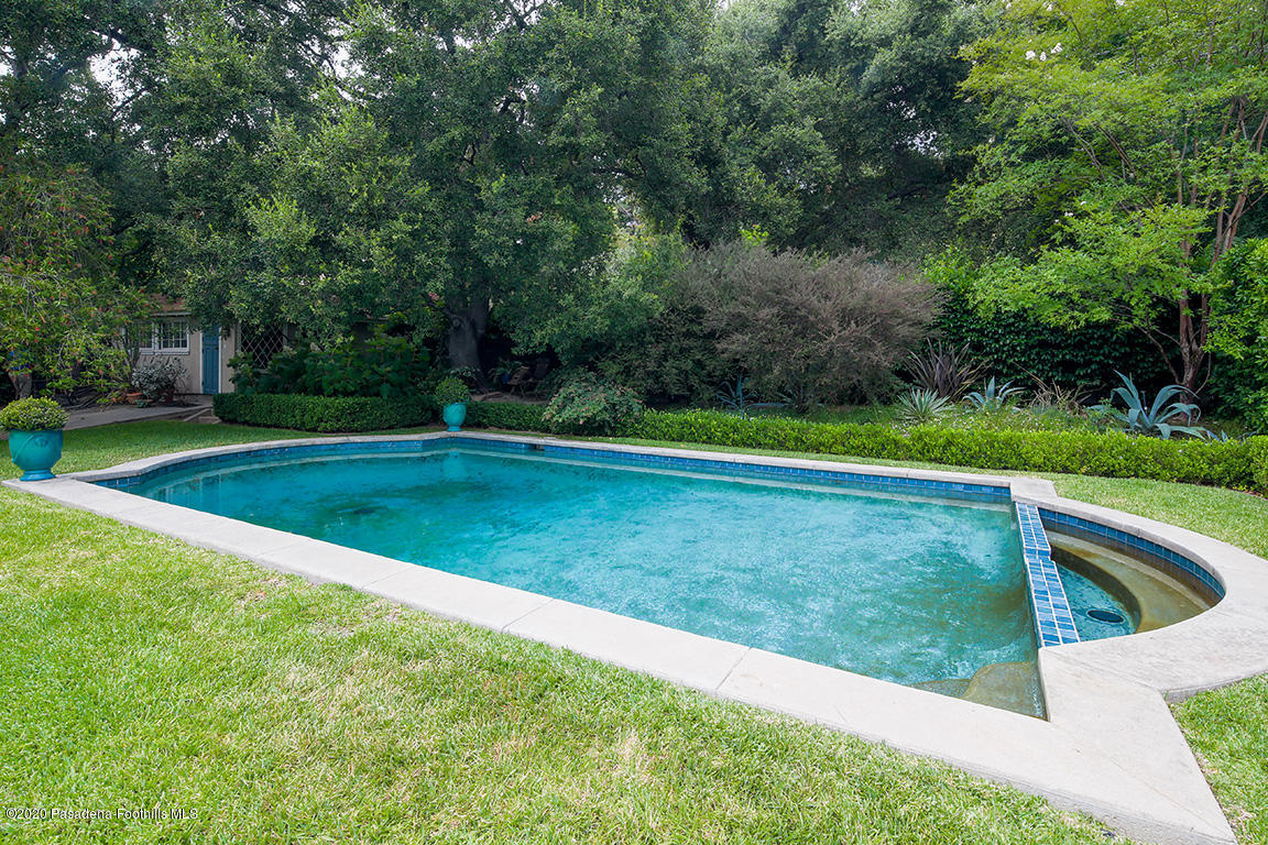 1987 Braeburn Road Altadena, CA 91001 - Photo 37 of 48 a view of a swimming pool with a yard