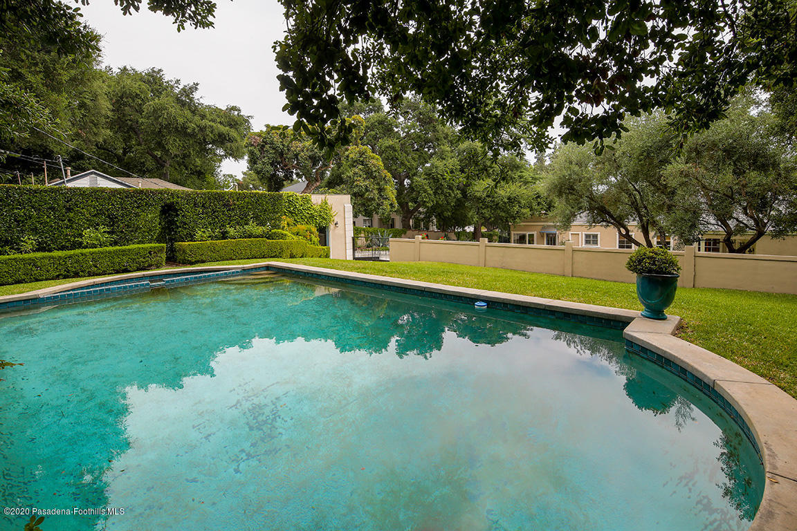 1987 Braeburn Road Altadena, CA 91001 - Photo 42 of 48 a view of a swimming pool with an outdoor space and seating area