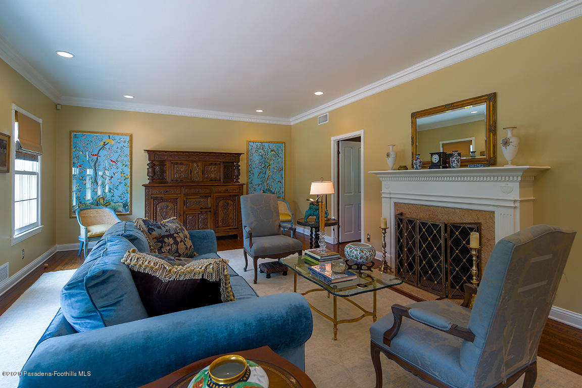 1987 Braeburn Road Altadena, CA 91001 - Photo 8 of 48 a living room with furniture and a fireplace