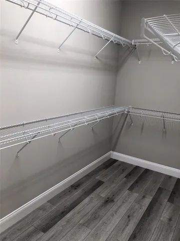 a view of a room with racks on the wall