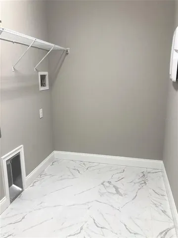 a view of a room with a bench