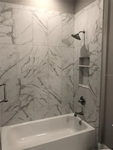 a bathroom with a bathtub