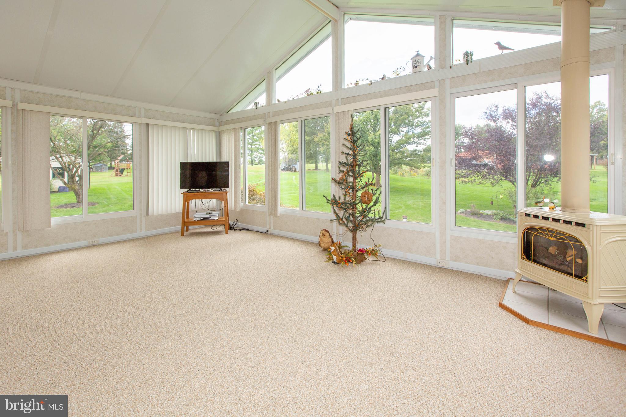 281 Township Line Road East Perkiomenville, PA 18074 - Photo 10 of 41 Open Sun Room with vaulted ceiling