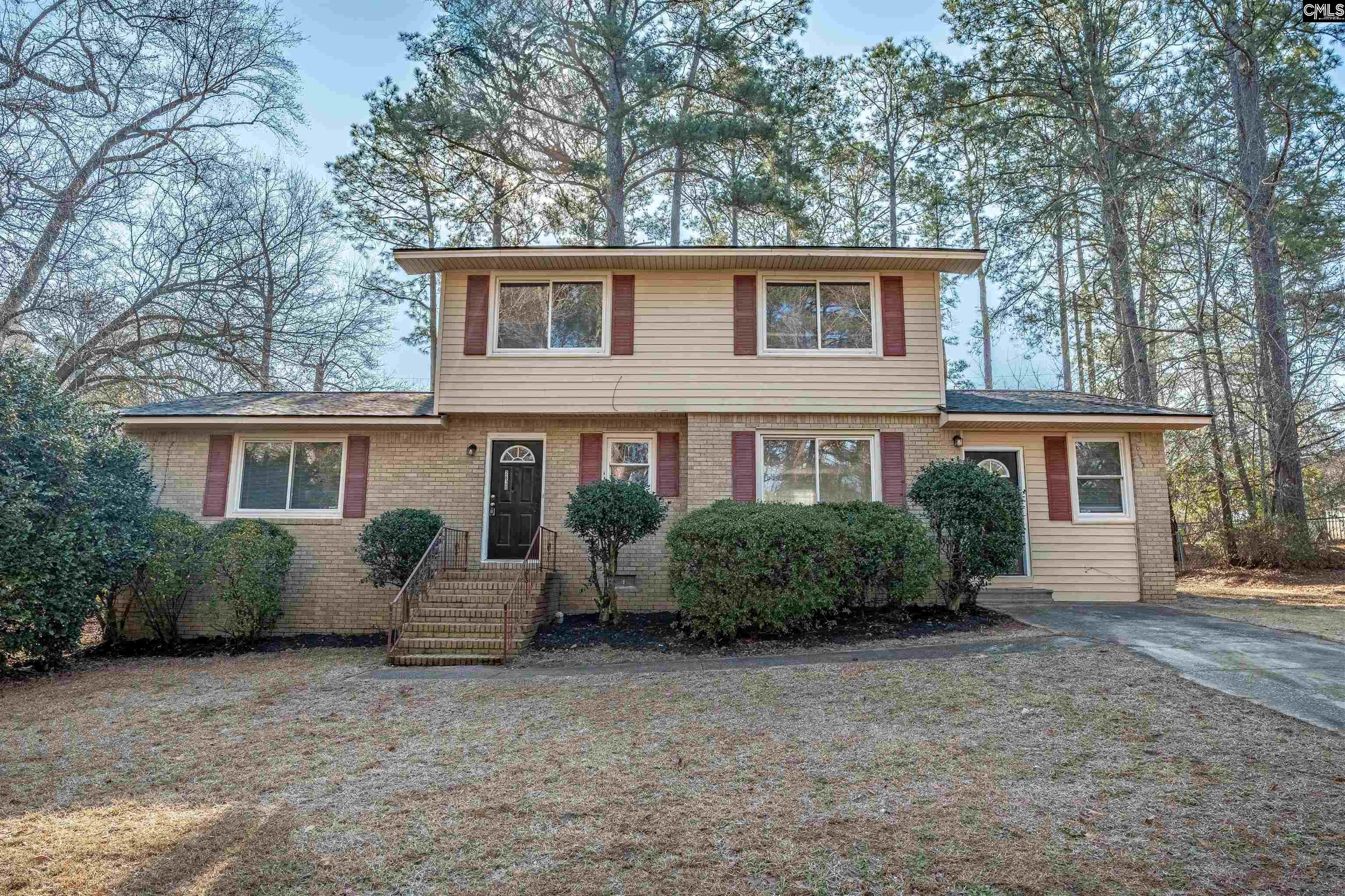 2620 Pleasant Ridge Drive Columbia, SC 29209 - Photo 1 of 37 a front view of a house with a garden