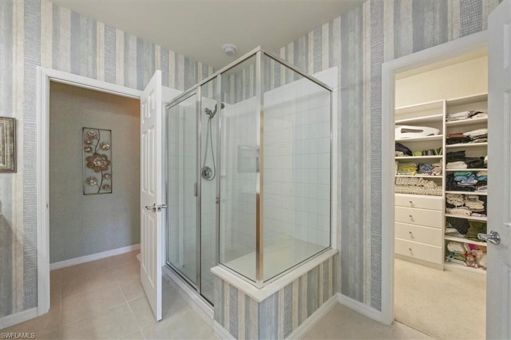 5705 Mayflower Way, Unit 1404 Ave Maria, FL 34142 - Photo 16 of 36 with large custom walk in closet